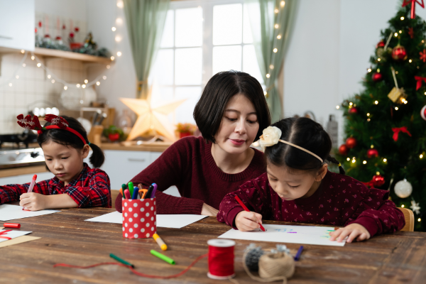 Children making Christmas wish lists