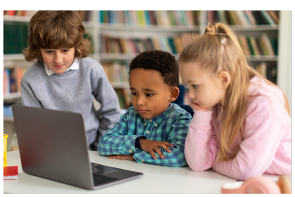 Children looking at a laptop